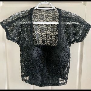 Lacey black crop top with built in bra fits cup A and B size small